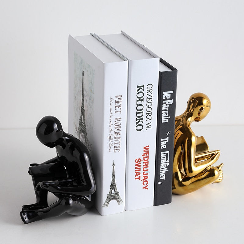 NUOVA COLLEZIONE - THE READERS -   SCULTURE FERMA LIBRI